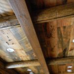 Carriage_House_Pine_Ceilings_with_Rough_Sawn_Timbers_and_Hand_Hewn_Rounds